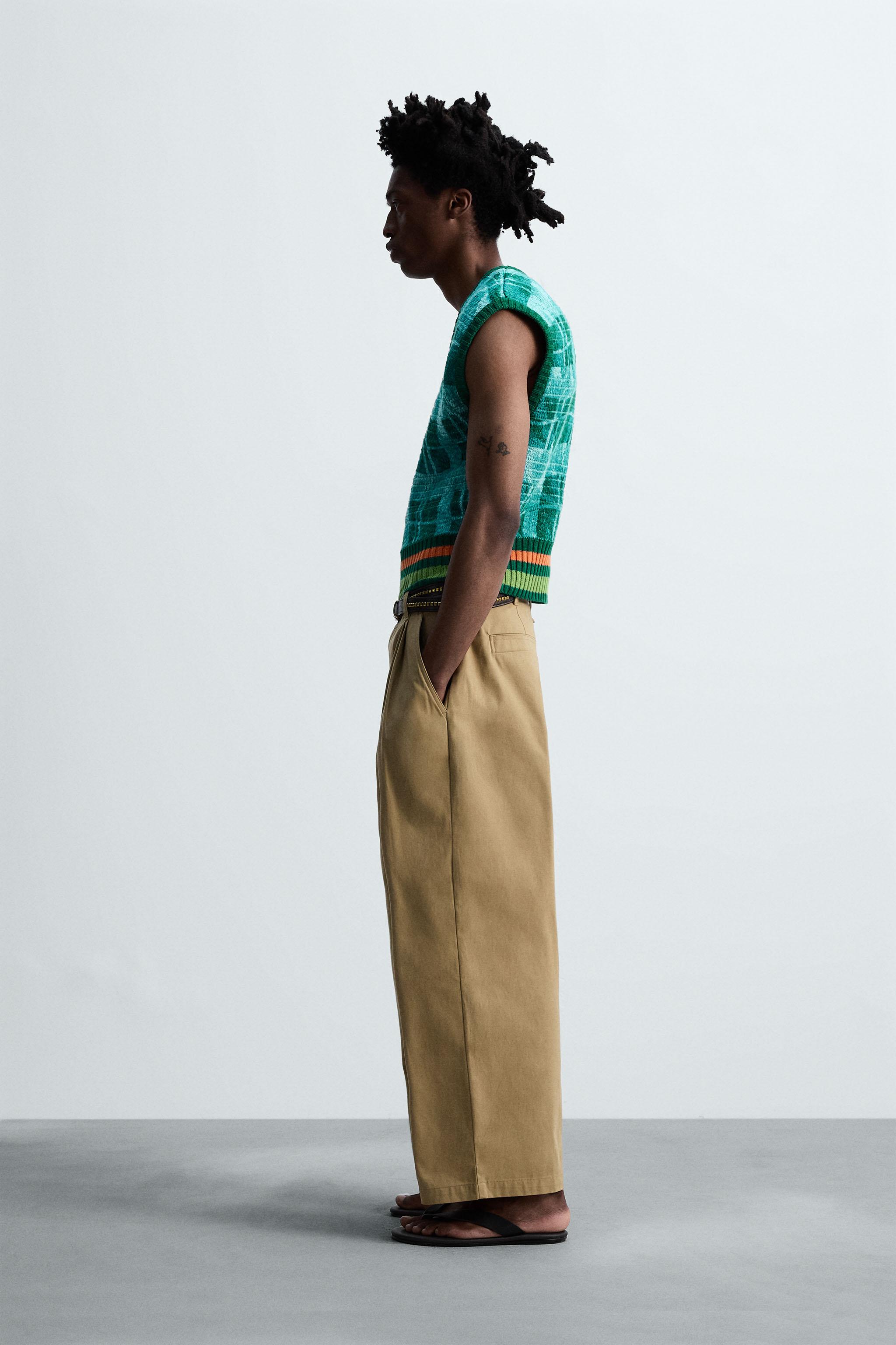 PLEATED WIDE FIT PANTS